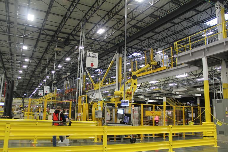 Kiva System robots move heavy shelves of product for DuPont's Amazon fullfillment center on Friday, Feb. 13, 2015.(Northwest Guardian photo/Christina Crea) Kiva System robots move heavy shelves of product for DuPont's Amazon fullfillment ...